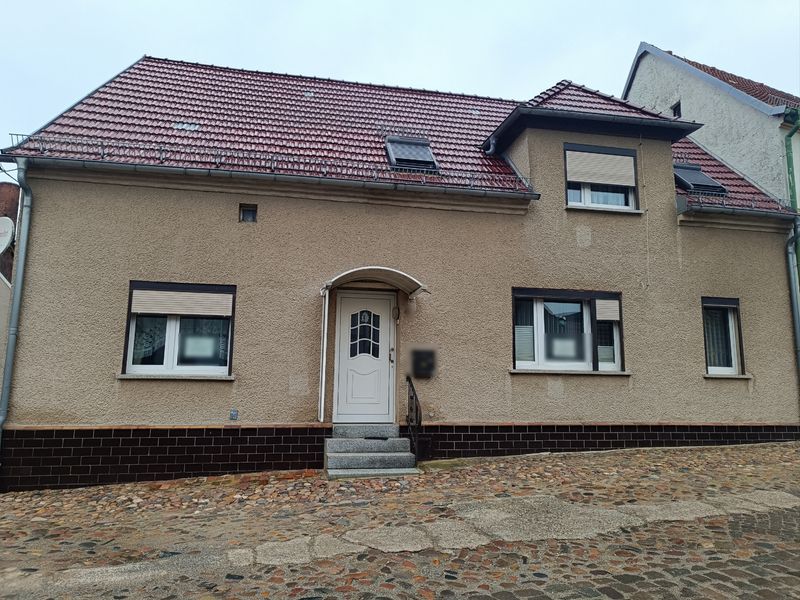 Reihenendhaus in ruhiger Stadtlage mit kleinem Garten und Nebengelass in Dommitzsch